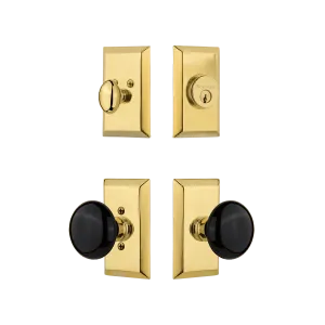Studio Entry Set with Black Porcelain Knob in Polished Brass